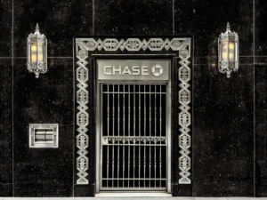 A remarkable Art Deco detail from the Chrysler Building in New York City, showing the Chase Bank entrance on Lexington Avenue. This photograph highlights the sleek geometry and decorative glass and steel screens designed to harmonize with William Van Alen’s iconic skyscraper.