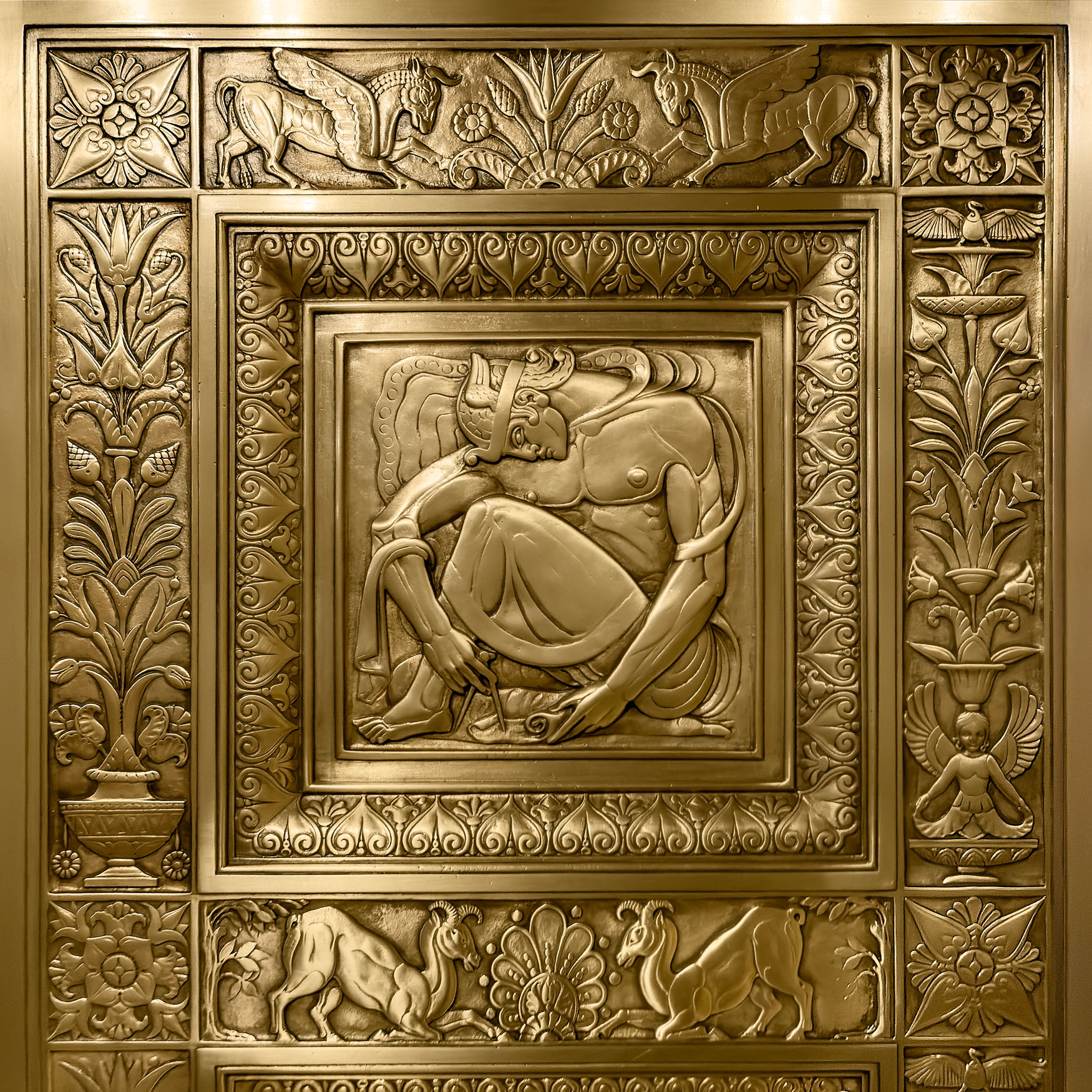 Industrial Worker — Fred F. French Building Elevator Panel (19 Agitation. Gilded Bronze Radiator Grill in the vestibule of the Chanin Building. By Rene Paul Chambellan 1929.