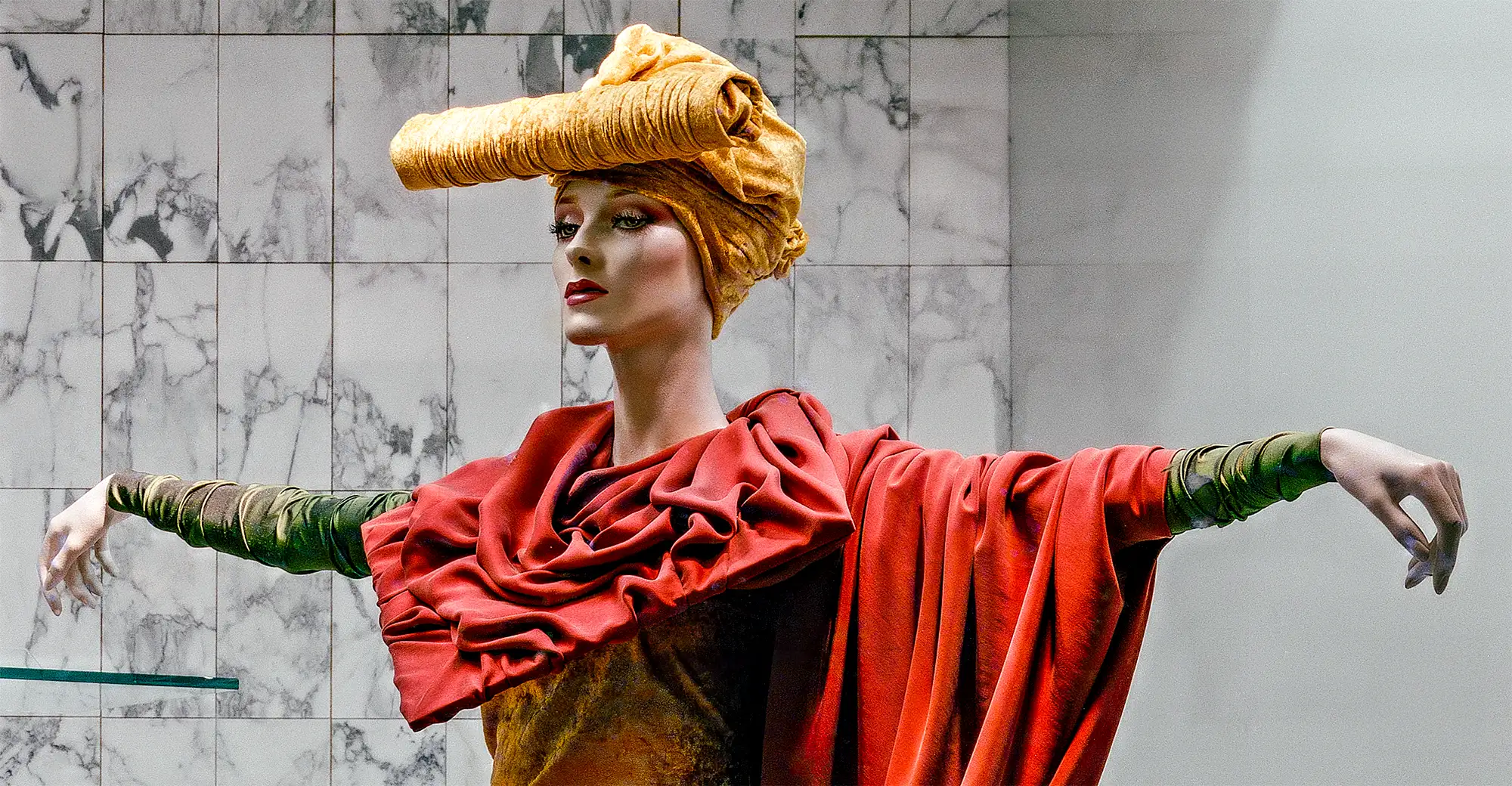 Hieratic mannequin dressed with fabrics — KaDeWe, Berlin, West Germany (1990) Hieratic mannequin dressed with fabrics in KaDeWe department store window, Berlin, 1990