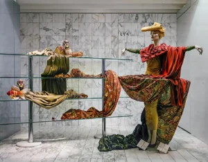 Hieratic mannequin dressed with fabrics in KaDeWe department store window, Berlin, 1990