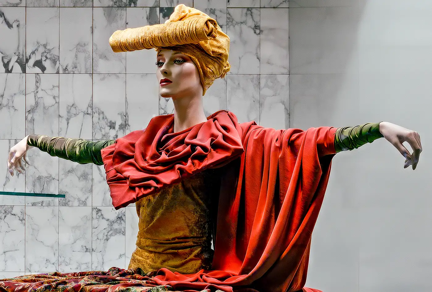 Hieratic mannequin dressed with fabrics in KaDeWe department store window, Berlin, 1990