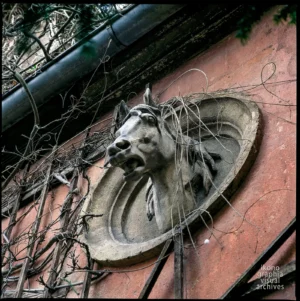 Ettore Bugatti's horse relief — Château Saint-Jean, Molsheim, Alsace, 1990. Photograph by Roberto Bigano.