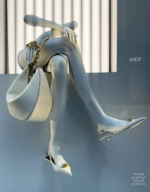 White Valentino slingback shoes on mannequin legs, 654 Madison Avenue New York, shop window 2024